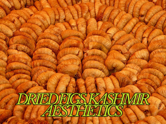 Premium golden dried figs from Kashmir arranged in neat rows, showcasing their natural wrinkled texture and rich amber color. High-quality Kashmiri dry fruits from Kashmir Aesthetics